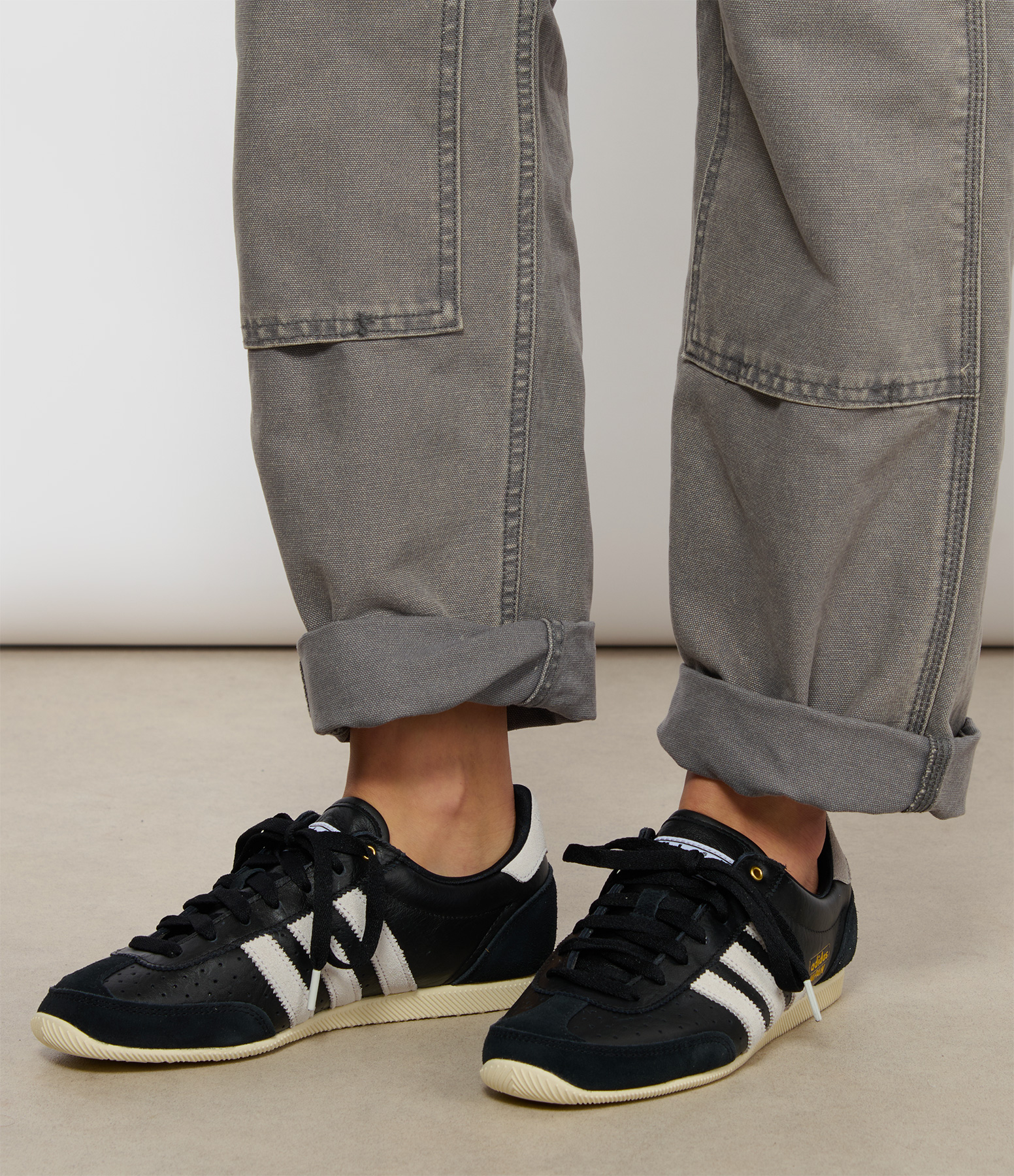 Japan W Core Black Cloud White Gold Metallic trainers