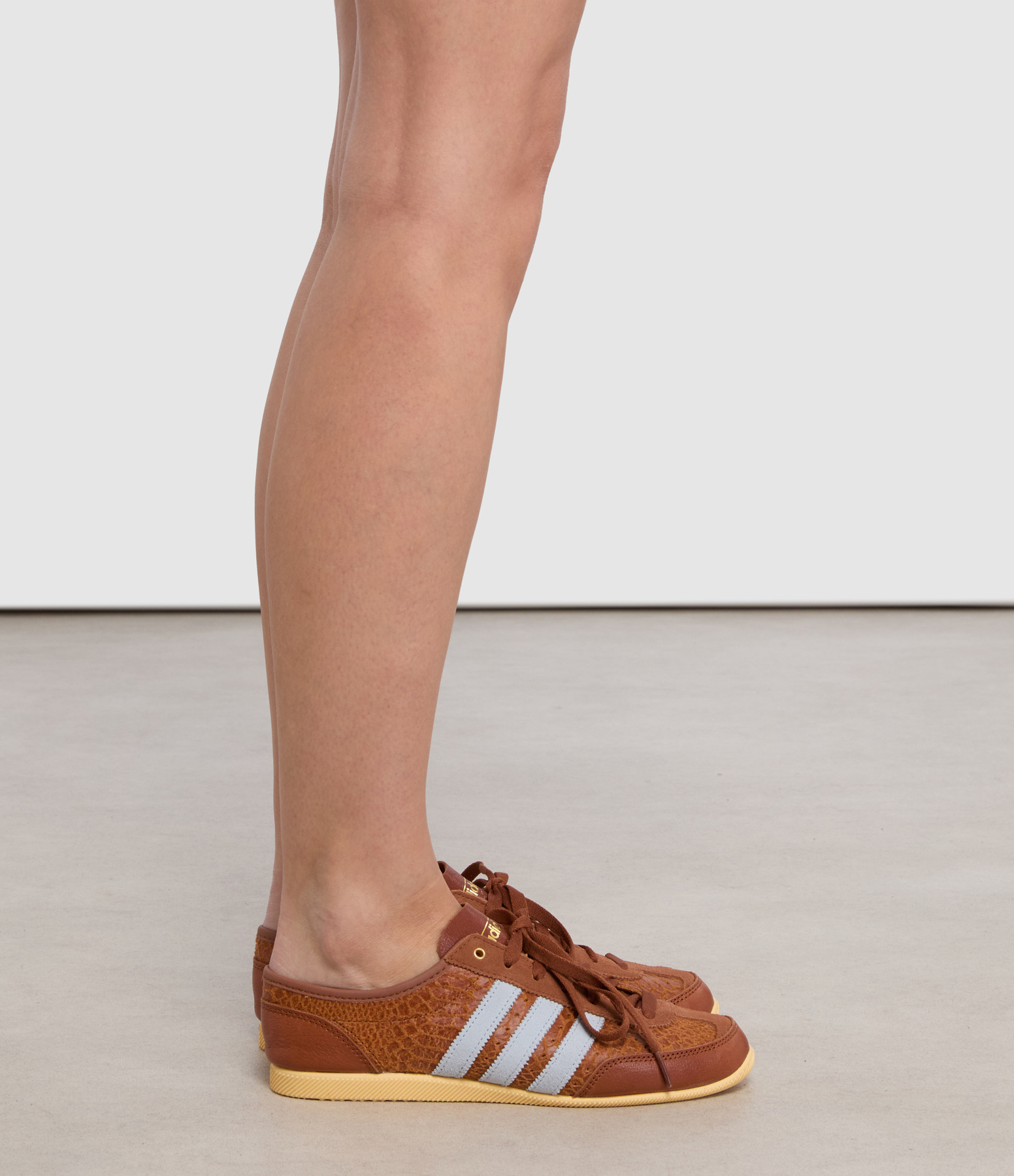 Japan Decon W trainers in Dusky Bronze/Crystal Sky/Orange Tint
