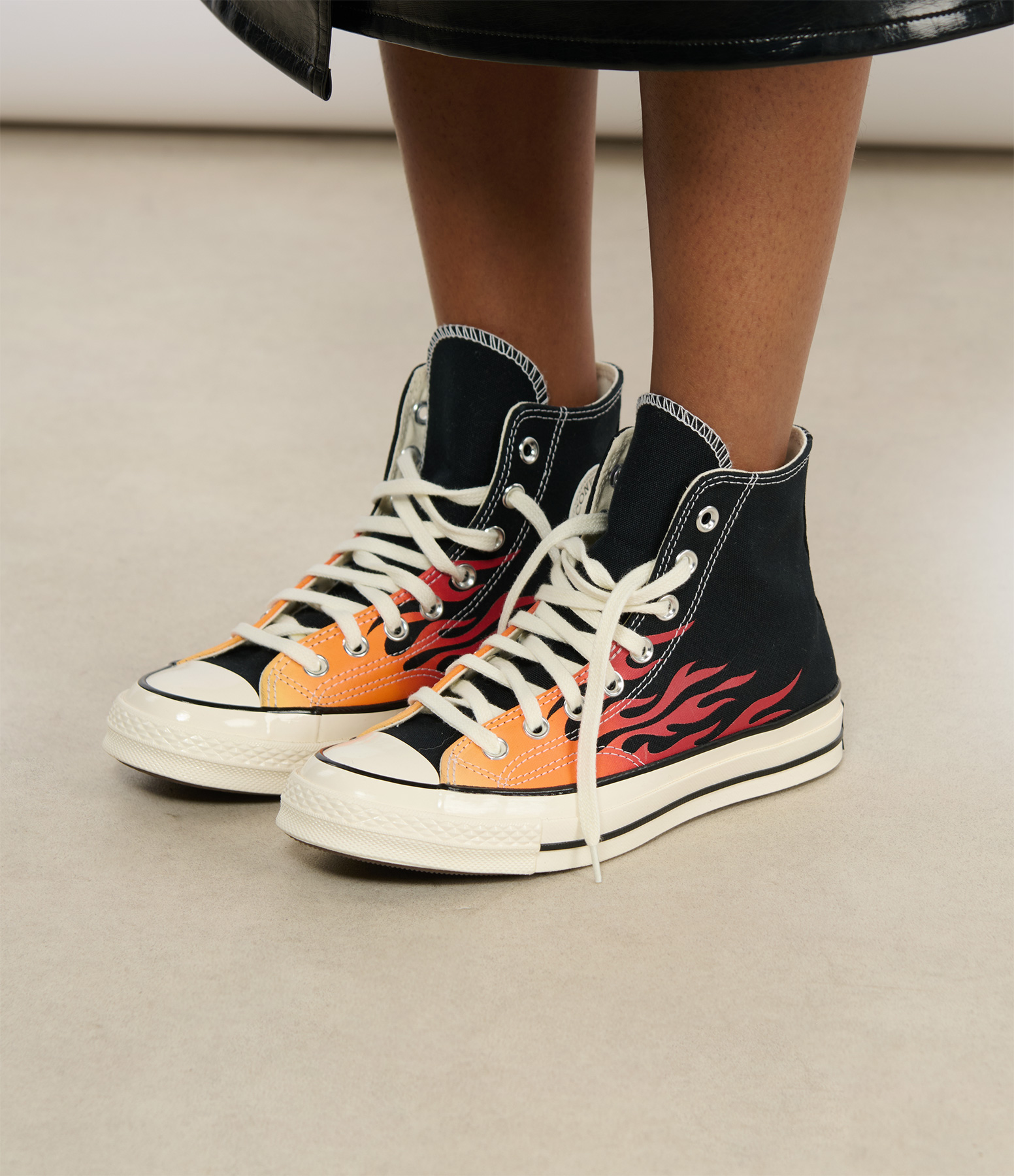 High-top trainers in black, red and yellow
