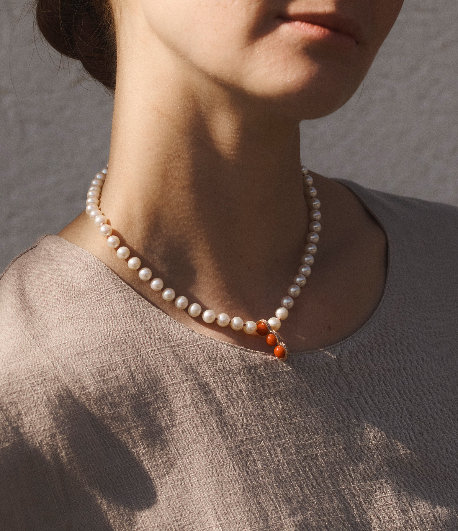 'Réserve' Necklace with Three Coral Pearls and a Rose Gold Freshwater Pearl Strand