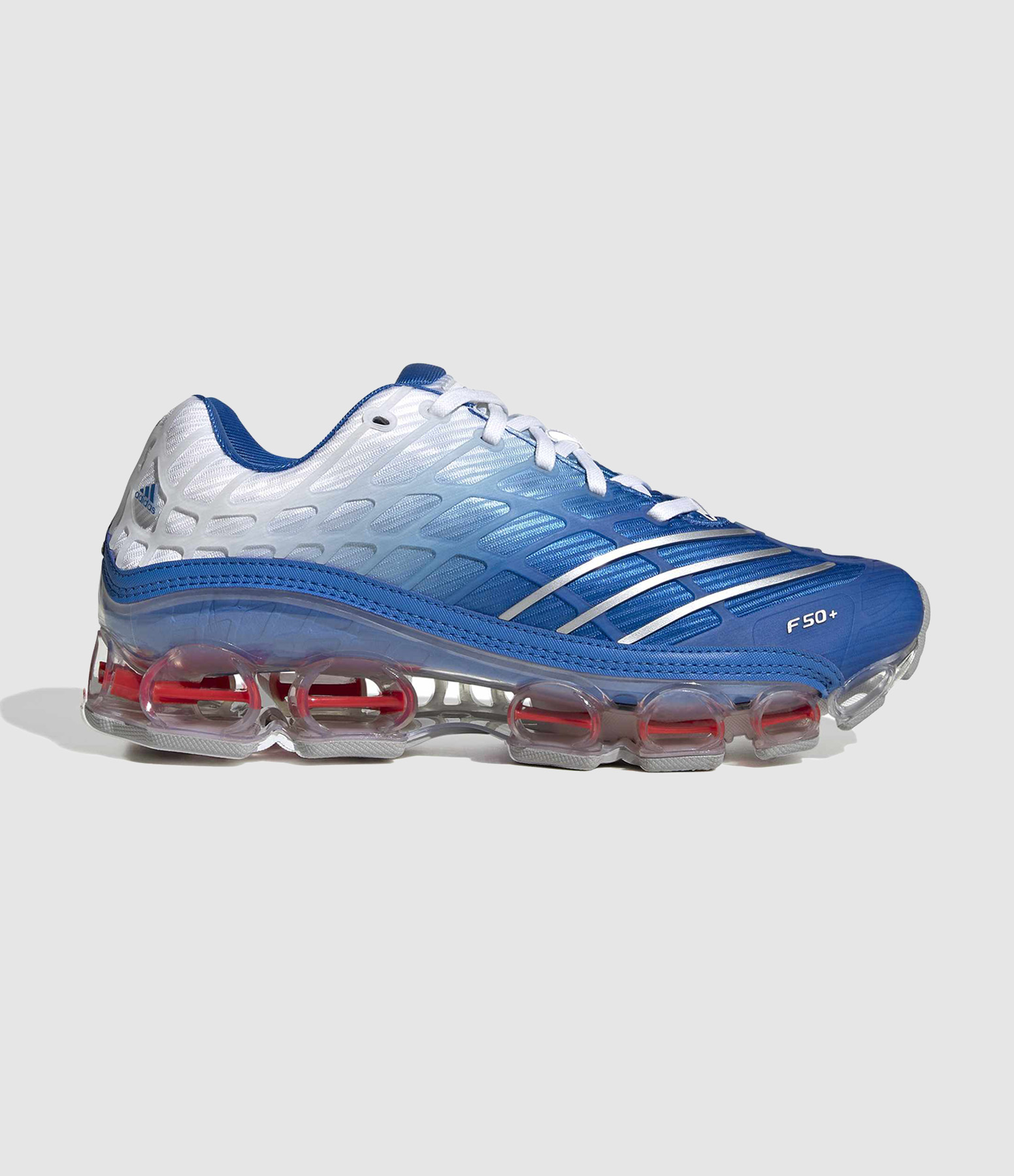 Megaride F50 trainers in Bluebird/Silver Metallic/Ftwr White