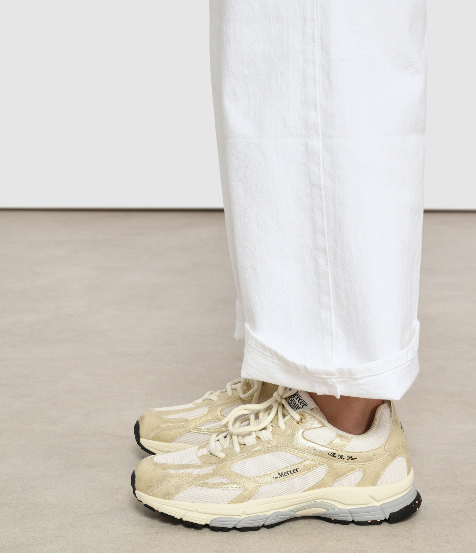 The Re-Run Metallic Gold trainers
