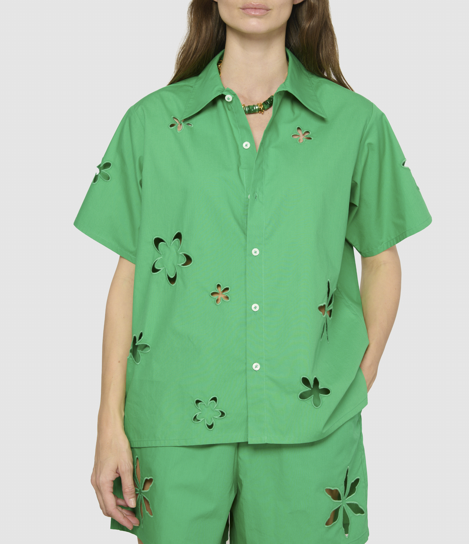 Green Shirt with Embroidered Cut-Out Flowers on the Sleeves