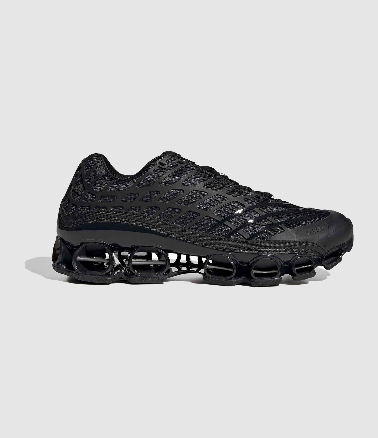 Baskets Megaride F50 Core Black/Core Black/Iron Met.